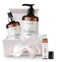 Lily Loaf product set including massage oil, room mist, and roller ball on a white background