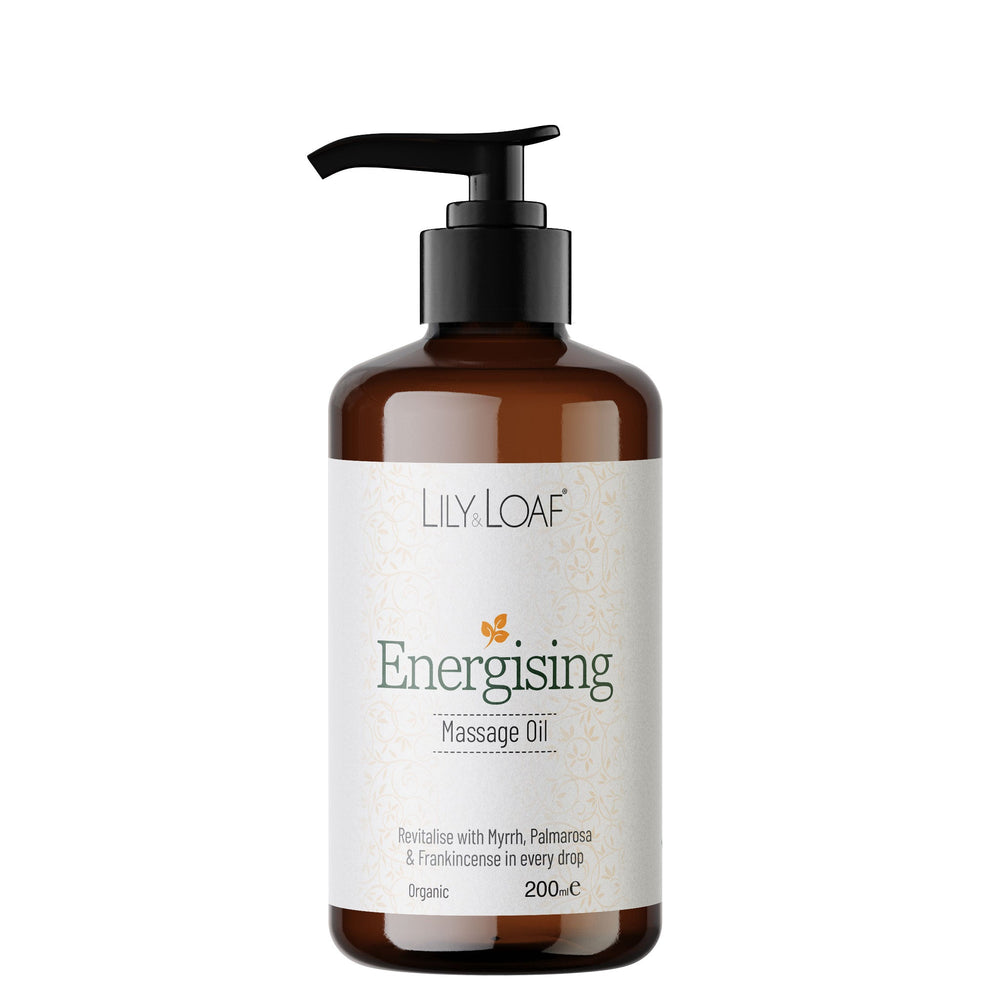 Brown bottle of Lily Loaf Energising Massage Oil on a white background