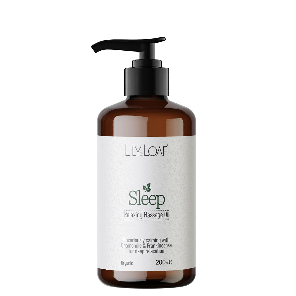 Brown bottle of Lily Loaf Sleep Relaxing Massage Oil on a white background